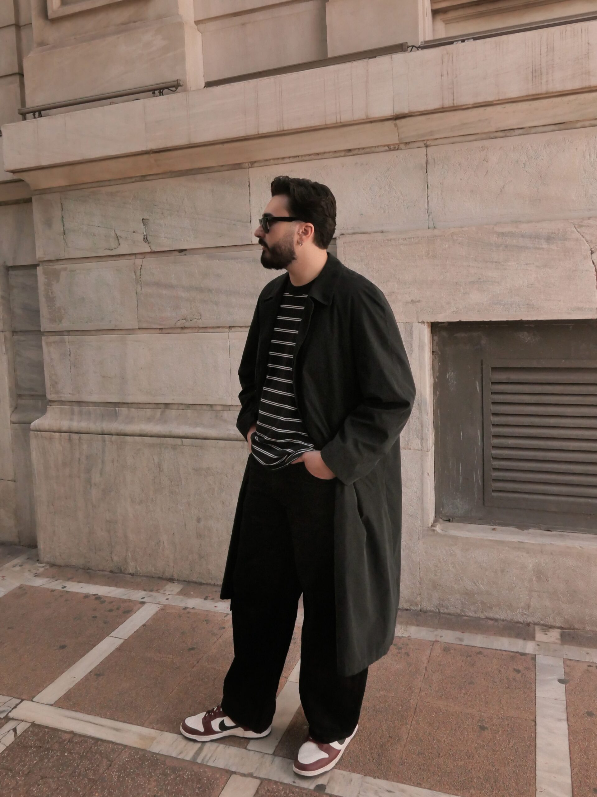 Black Power Trench Coat with belted waist and structured silhouette