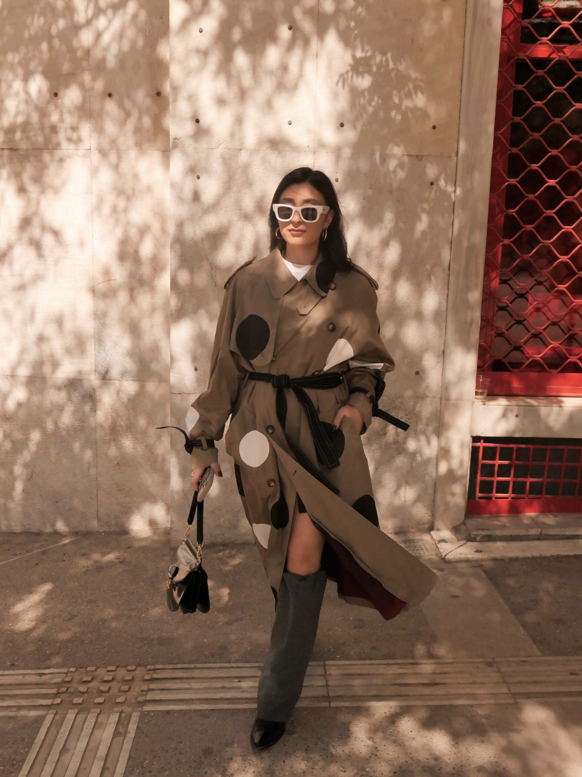 Polka Dots Trench Coat styled in an urban streetwear look by AFTERPARTY