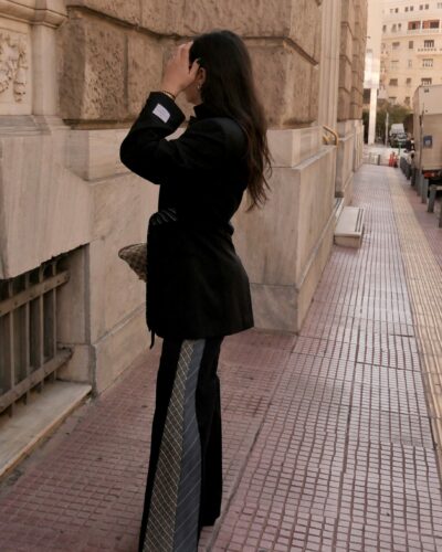 Side view of blue Tie Panel Trousers with tie-inspired details